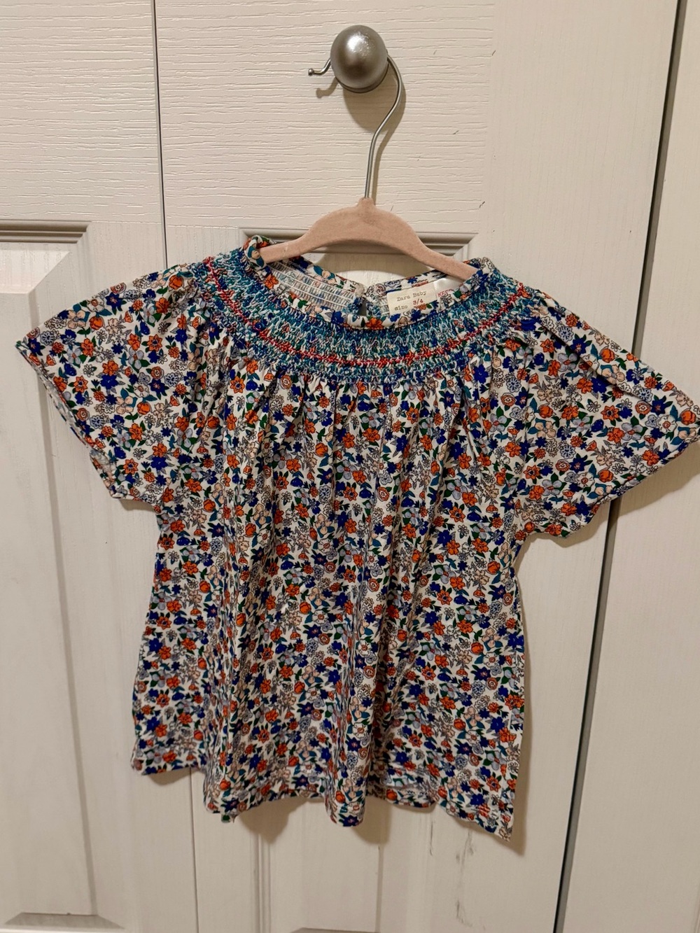Zara White Floral Smocked Short Sleeve Top with Blue & Orange Flowers